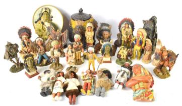 A large group of Native American related resin figures and busts.