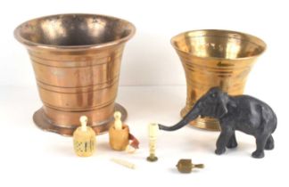 A group of collectables comprising a Chinese spelter elephant, a bone and ivorine tape measure,