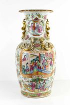 A 19th century Chinese vase, modelled with gilded salamander to the body, dogs of fo to the neck,