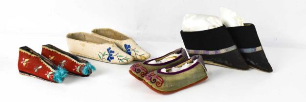 A selection of Chinese hand made and embroidered footwear, to include a pair of late 19th century