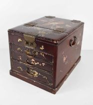 A 19th century red lacquered Chinese vanity case, with mother of pearl inlaid bird of paradise to