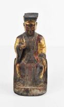 A Chinese carved wooden figure of an Emporar, possibly Ming/Qing dynasty or Deity figure, seated