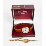 A 9ct gold ladies wristwatch, with 9ct gold stretch-link strap, and having a square form Roman