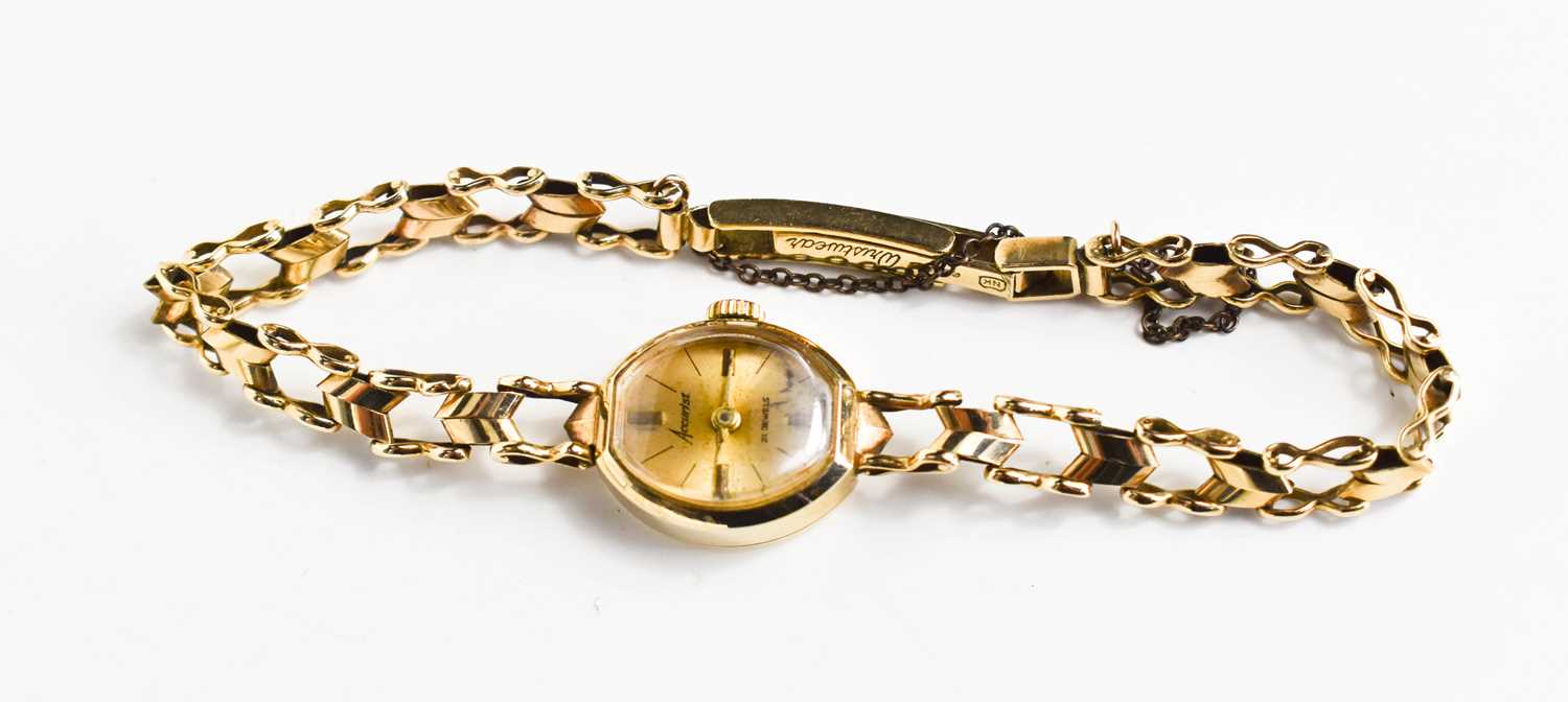 A lady's 9ct gold cased Accurist wristwatch, with 9ct gold bracelet strap, 11.4g, including