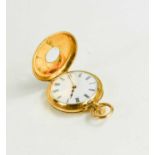 A Klaftenberger 18ct gold cased, keyless wind, half hunter pocket watch, the white enamel dial