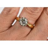 An 18ct gold and solitaire diamond ring, the diamond of approximately 1ct, 6.38 by 6.42 by 3.88mm,