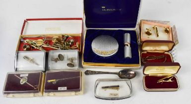 A group of cuff links, mostly gold plated examples, in original boxes, a DuBarry boxed compact and