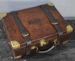 An early 20th century leather cartridge case, with a fitted interior, by John Blanch & Son