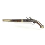 A late 18th century highly decorated flintlock pistol with inlaid silver decoration throughout,