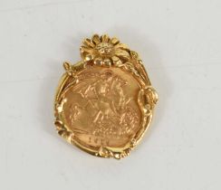 A George V gold half sovereign, dated 1914, with 9ct gold Art Nouveau floral mount, total weight 6.