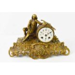 A French brass cased mantle clock, the case modelled with a young swain with hat and satchel, the