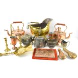 A quantity of metalware to include copper kettles, copper powder flasks, brass coal scuttle,