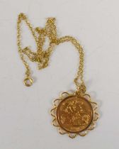 A George V gold half sovereign set in a yellow metal pendant on a 9ct gold chain, 6.46g.