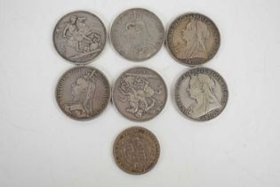 Six Queen Victoria silver crowns, dated 1889,1896, 1897, 1887 together with a silver half crown.