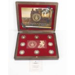 A cased set of eight 24ct gold coins commemorating 200 Years of the British Empire, each coin weighs