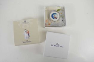 A Royal Mint 2021 silver proof "The Snowman" 50p coin, with original box and certificate.