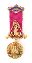 Masonic Interest: A 9ct gold jewel on ribbon, Temple Fortune Chapter, the jewel set with a pink