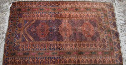 A small Middle Eastern prayer mat.