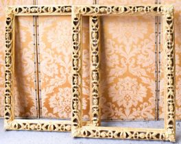 A pair of modern giltwood carved and pierced frames, in the 17th century style, 111 by 85cm.