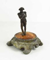 A bronze figure of Napoleon, 19th century, raised on an associated wooden and cast metal base,