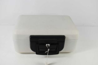 A cream coloured lockable strong box carry case, with key, 37 by 16 by 29cm high including catch.