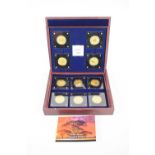 A 24ct gold eight coin set of African wildlife, with fitted case and with certificate, limited