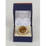 A gold half sovereign set in a 9ct gold ring, the ring inset with diamonds, limited edition of