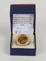 A gold half sovereign set in a 9ct gold ring, the ring inset with diamonds, limited edition of