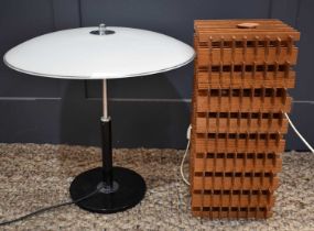 Two Mid Century table lamps, one of wooden slatted form, the other having a domed opaque glass