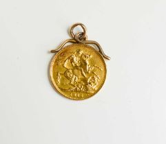 A George V gold sovereign, dated 1915, in 9ct gold scroll mount, total weight 8.86g.