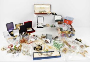 A large selection of vintage and later jewellery including silver examples, jade beaded necklaces,