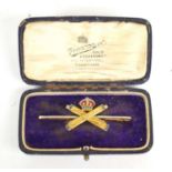 A 15ct gold and enamel sweetheart brooch for the Machine Gun Corps, the crown set with diamonds