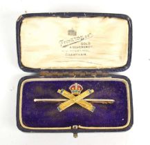 A 15ct gold and enamel sweetheart brooch for the Machine Gun Corps, the crown set with diamonds