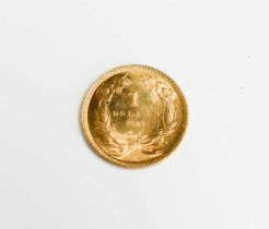 A USA gold dollar dated 1862.