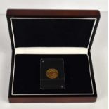 A Queen Victoria gold sovereign with Jubilee head, dated 1892, set within a sealed plastic capsule.