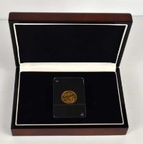 A Queen Victoria gold sovereign with Jubilee head, dated 1892, set within a sealed plastic capsule.