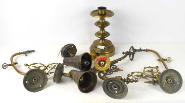 A brass candlestick, 27cm high, together with a pair of vintage wall bracket gas lamp fittings, with