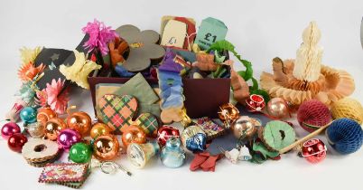 A group of 20th century vintage Christmas decorations, including paper candle, baubles and glass