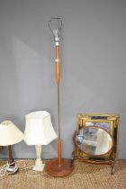 A Mid-Century teak and brass standard lamp, together with a marble based table lamp, a turned wood