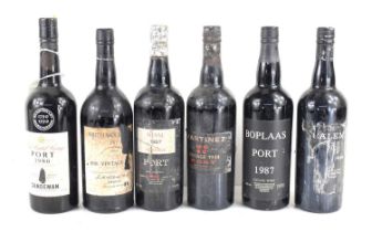 Six bottles of mixed Vintage Port, comprising Sandeman 1986, Late Bottled Vintage, Boplaas 1987,