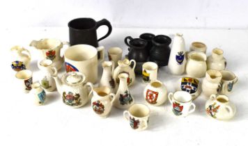 A group of crest ware to include examples by W.H Goss together with a small group of pewter