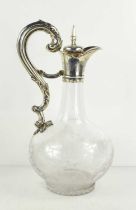 A William IV/Early Victorian claret jug, the body engraved with garlands of vines and fruit, with