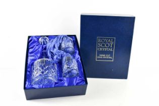 A Royal Scot Crystal decanter set comprising two small whiskey tumblers, and a small decanter, in