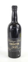 A bottle of Croft's 1955 Vintage Port, cap and label present, some signs of seepage. From the