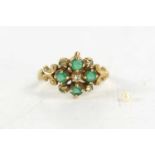 A 9ct gold, diamond and emerald ring, of vintage style, set with four emeralds in a quatrefoil,