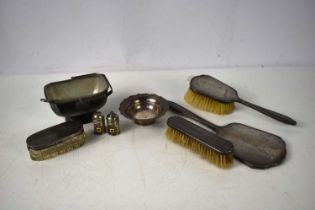 A group of silver and plated items, comprising a silver backed hairbrush, clothes brush and