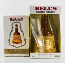 A bottle of Bell's Scotch Whisky, and a half bottle of the same both in bell shaped decanters,