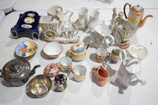 A group of ceramics including a Noritake part tea set, porcelain clock with hand painted reserves