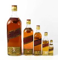 A Magnum bottle of vintage 70% proof Johnnie Walker Red Label Scotch Whisky, 80 fl.oz, together with