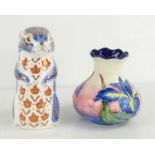 A Royal Crown Derby paperweight in the form of a chipmunk and an Old Tiptonware vase, trail